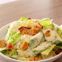 Cesare · Hearts of Romaine Salad, Tossed in a House made Cesar dressing, Served with House made Garli...