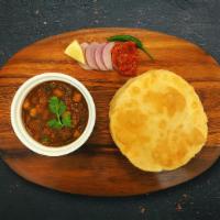 Chole Bature · Whole chickpeas, slow cooked in an onion and tomato curry with Indian whole spices, served  ...