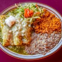 Enchiladas Suizas · Chicken enchilada smothered with our special green tomatillo sauce and melted cheese. Served...