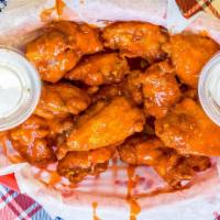 Chicken Wings · Available as Plain, Buffalo Wings, or BBQ Flavored.