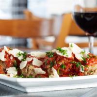 Meatball Appetizer · Our homemade meatballs topped with our own marinara sauce and shaved parmesan.