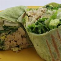 Grilled Chicken Caesar Wrap · chicken breast, romaine lettuce, Caesar dressing, and parmesan cheese.