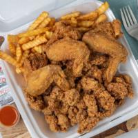 Wings & Gizzards · Cooked wing of a chicken coated in sauce or seasoning. an organ commonly found in birds and ...