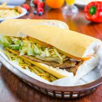 Pan Con Bistec · Cuban bread with a palomilla steak, julienne fries, lettuce, tomato and mayonnaise.

Pan cub...
