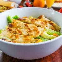 Ensalada Cesar Con Pollo · Traditional Caesar salad with grilled Chicken. Comes with your choice of dressing.