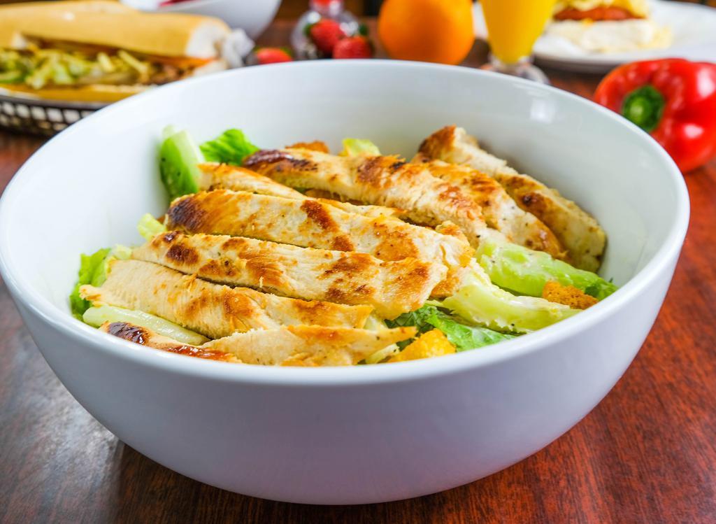 Ensalada Cesar Con Pollo · Traditional Caesar salad with grilled Chicken. Comes with your choice of dressing.
