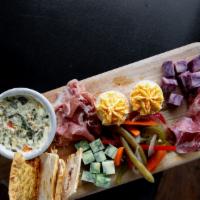 Charcuterie Board · cured/ smoked meats, artisan cheeses,  pimento cheese, spinach & artichoke dip, pickled vege...