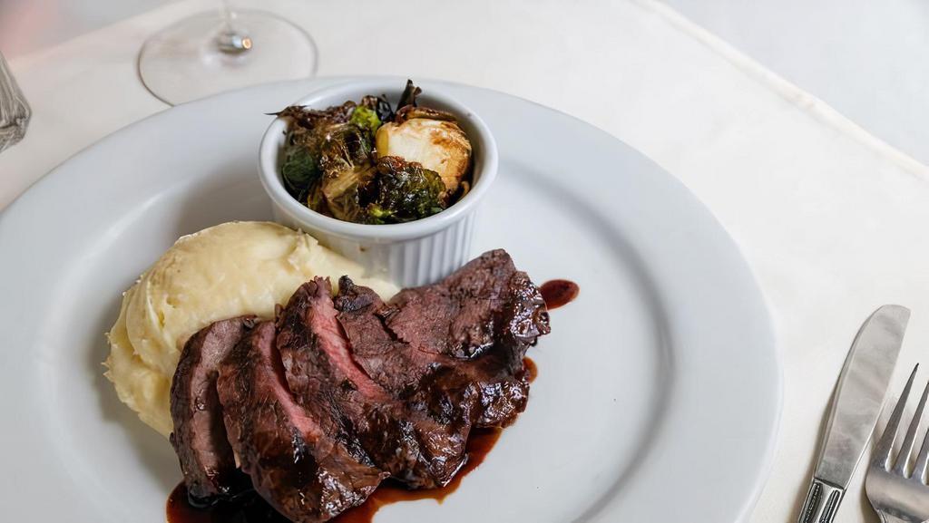 8Oz Snake River Farms American Wagyu Flat Iron · Whipped potatoes, crispy brussels sprouts, black garlic rosemary demi-glace