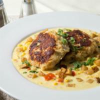 Sautéed Jumbo Lump Crab Cakes (2) · Two of our amazing crab cakes, crispy potatoes, garlic green beans, and champagne-lobster be...