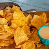 Queso · Mexican cheese dip and it's muy bueno (that means very good)