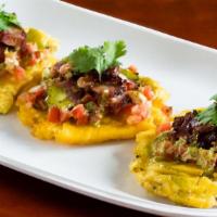 Bbq Tostones (Appetizer) · Three crispy tostones covered with Beef Brisket, Pulled Chicken or Chopped Pork topped with ...