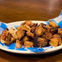 Chicharron (Appetizer) · Deep-fried crispy pork belly rinds.