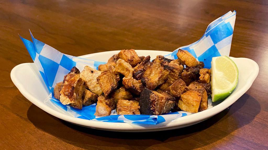 Chicharron (Appetizer) · Deep-fried crispy pork belly rinds.