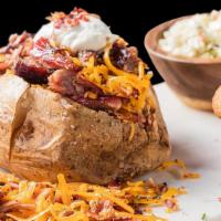 Bbq Stuffed Baked Potato · Choose: Georgia Chopped Pork, BBQ Pulled Chicken, or Texas Beef Brisket. Served with choice ...