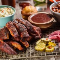 Southside Rib Tips (Platter) · Pound of memphis style, dry rubbed tips. Served with a side of jalapeno pickled red onions, ...