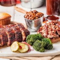 2 Meat Combo · Double your pleasure with two different meat selection. Served with two sides and a corn bre...
