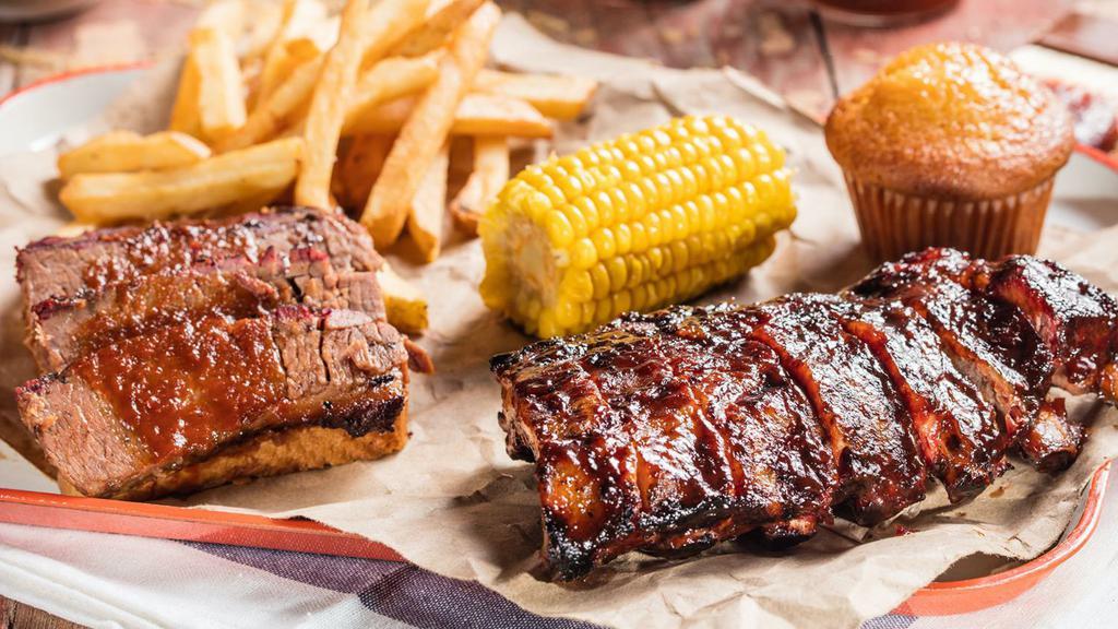 Baby Back & Meat Combo · A 1/2 slab (6 Bones) of Baby Back Ribs and choice of 1 meat selection. Served with choice of 2 sides and a Corn Bread Muffin.