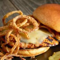 Cajun Chicken Sandwich · Cajun-seasoned and grilled chicken breast topped with pepper-Jack cheese fried Onion Strings...