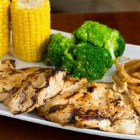 Grilled Chicken Breast · Juicy chicken breast marinated and then grilled. Served with choice of 2 sides and a Corn Br...