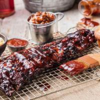 Baby Back Ribs (A La Carte) · Two slow-smoked options: Original-Style with Famous Dave’s own Chicago-style rib rub then sa...