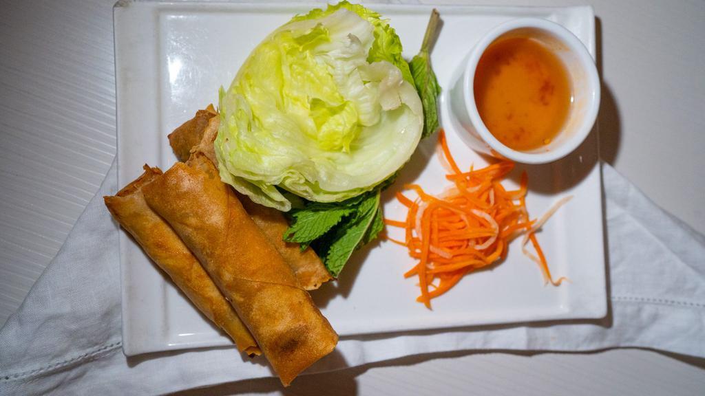 Fried Shrimp & Pork Imperial Rolls · Traditional Vietnamese egg rolls with shrimp and pork. Served with Vietnamese dipping sauce, lettuce, and mint.
