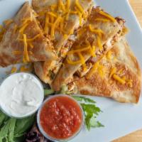 Grilled Chicken Fajita Quesadilla · Grilled white meat chicken folded into a flour tortilla with melted monterey jack and chedda...