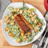 Blackened Mahi Caesar Salad · Filet of delicious mahi mahi blackened in our own spice, served on a zesty caesar salad of r...
