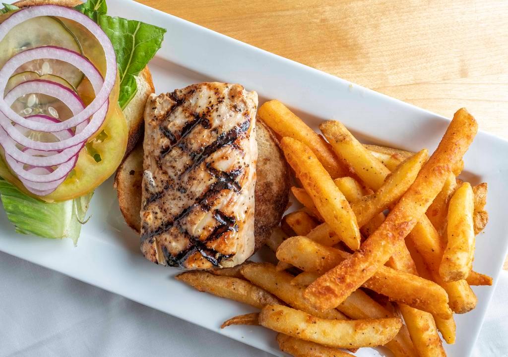 Blackened Mahi Sandwich · Filet of delicious mahi mahi blackened in our own spice, served on a Brioche bun, with leaf lettuce, sliced red onion and homemade pickle slices. Also available grilled or fried.