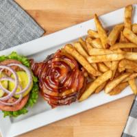 Western Burger · Angus burger topped with bacon, cheddar cheese and bbq sauce, served on a brioche bun.