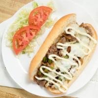 Philly Steak Sandwich · Served with green peppers, onion, mushroom, mayo, cheese, tomatoes and lettuce.