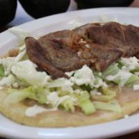 Huarache Con Carne · Choose of /Steak,Chicken or Pastor (marinated pork)