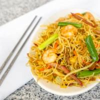 Singapore Style Rice Noodles · Shrimp, B.B.Q. pork and rice noodles stir fried in a spicy curry sauce.