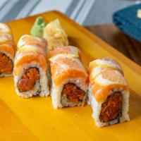 Pink Lady Roll · Spicy tuna, salmon, and lemon on the top.