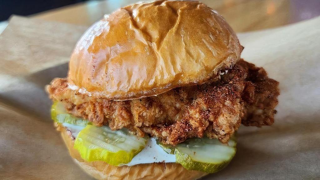 Cajun Chicken Sandwich · Crispy, double battered fried chicken breast, tossed with Cajun Dry Rub seasoning, with pickles and jalapeno ranch.