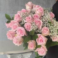 Pink World · 24 Light Pink Roses hand wrapped and delivered to your special person.