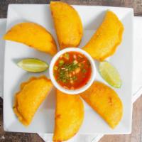 Empanadas · Gluten free. With choice of filling: cheese, chicken, beef or mini beef.