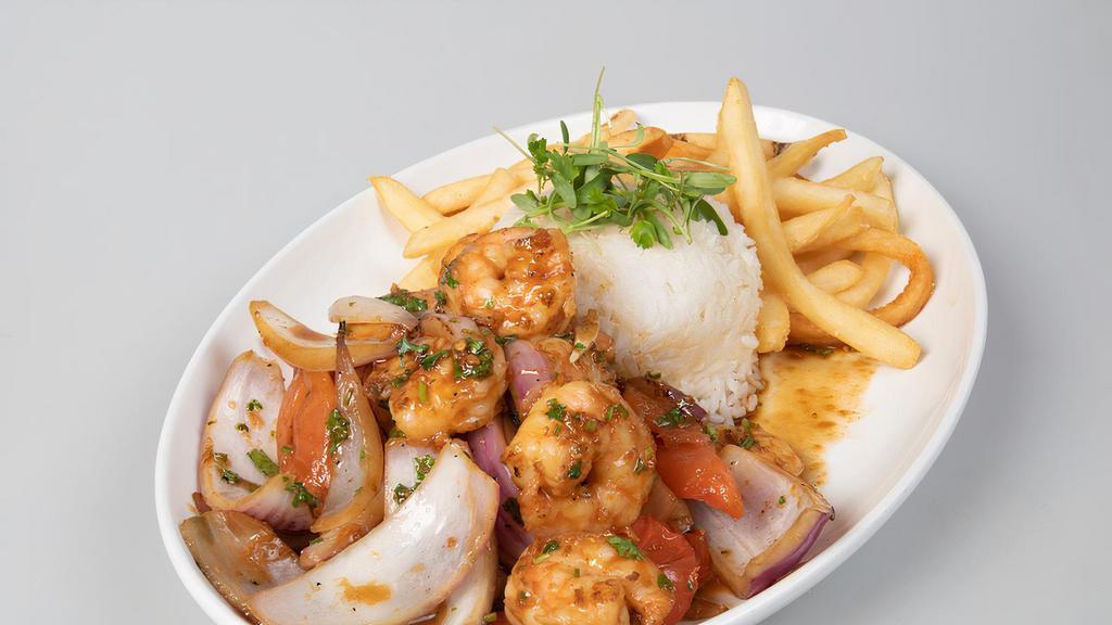 Saltado De Camarones · Latin-style, wok-sautéed shrimp. Includes two sides.