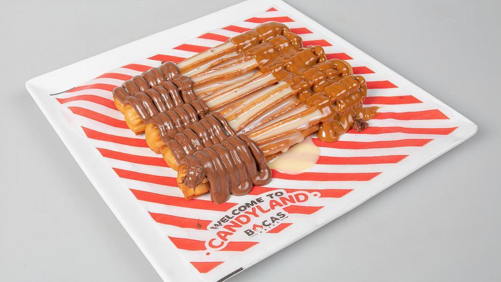 Churros · Pop churros with the toppings of your choice (nutella, condensed milk, dulce de leche).