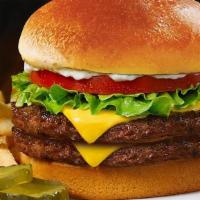 2 Double Cheeseburger Plates · 2 double burgers topped with American cheese, lettuce, tomato, and pickles served on a seede...