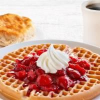 Strawberry Topped Waffle Combo · A golden waffle topped with strawberries and whipped cream. Served with a choice of buttery ...