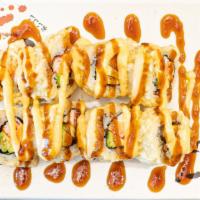 Grayson Roll · Fresh salmon crab and avocado inside deep tempura fried topped with special sauce. wrapped w...