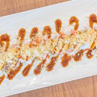 Red Devil Roll · 2 pieces of shrimp tempura, avocado, topped with shredded crab and spicy mayo and eel sauce ...