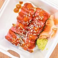 Twin Tuna Roll · Escolar inside, topped with Tuna eel sauce, sriracha, scallion, sesame seeds and a touch of ...