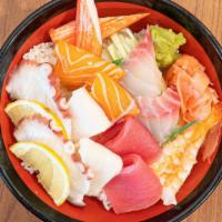 Dinner Chirashi(12Pcs, Miso+Salad) · Twelve pieces assorted fish on top of a beautiful bowl of sushi rice.
