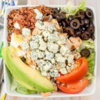 California Cobb Salad (Small) · Iceberg lettuce, grilled chicken breast, bacon, hard boiled eggs, black olives, tomato, gorg...