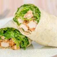 Chicken Caesar Wrap · Romaine lettuce, grilled chicken, and grated Parmesan cheese. Served with caesar dressing on...