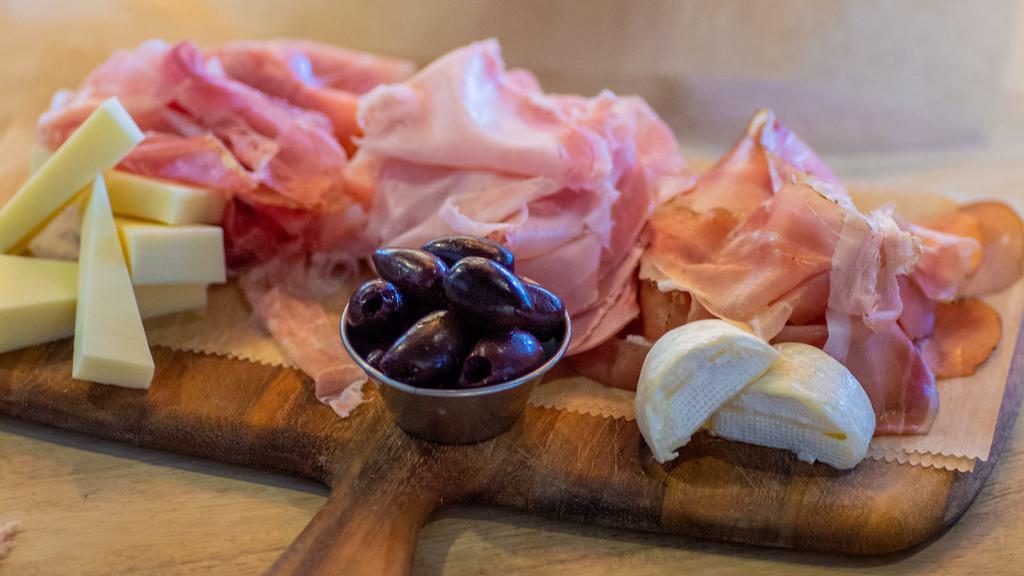 Antipasto Spris · Assorted Italian cold cuts, cheese, olives.