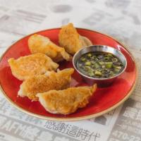 Yi-Yi'S Chicken Dumplings · Four per order, chicken dumplings served with a sweet soy dipping sauce with choice of steam...
