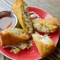 Chicken Egg Rolls · Deep fried egg noodle wrap stuffed with minced chicken, cabbage and carrots served with Hawk...