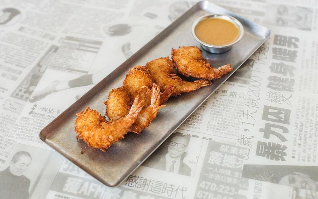 Coconut Shrimp · five per order, coconut breaded shrimp served with our signature curry dipping sauce | Some Heat